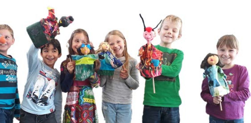 Kinder mit Handpuppen